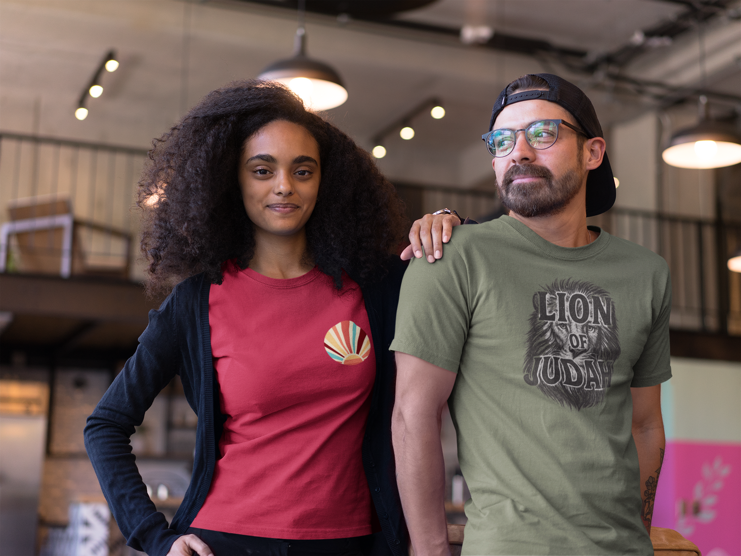 Models wearing red and olive Christian t-shirts from Eloise James Shop — faith-inspired apparel for everyday believers