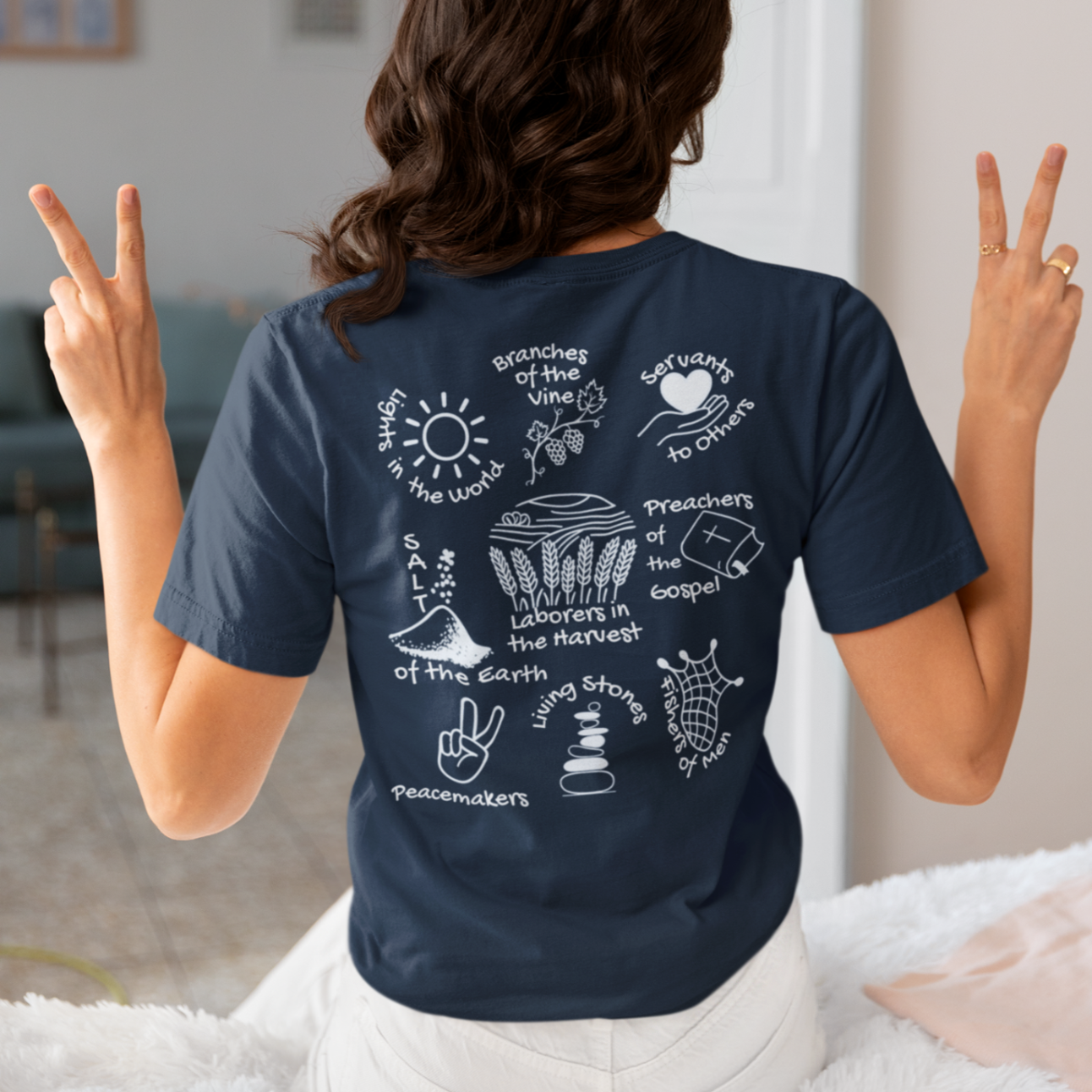Back view of Christian graphic tee with hand-drawn faith icons and inspirational phrases — Eloise James Shop